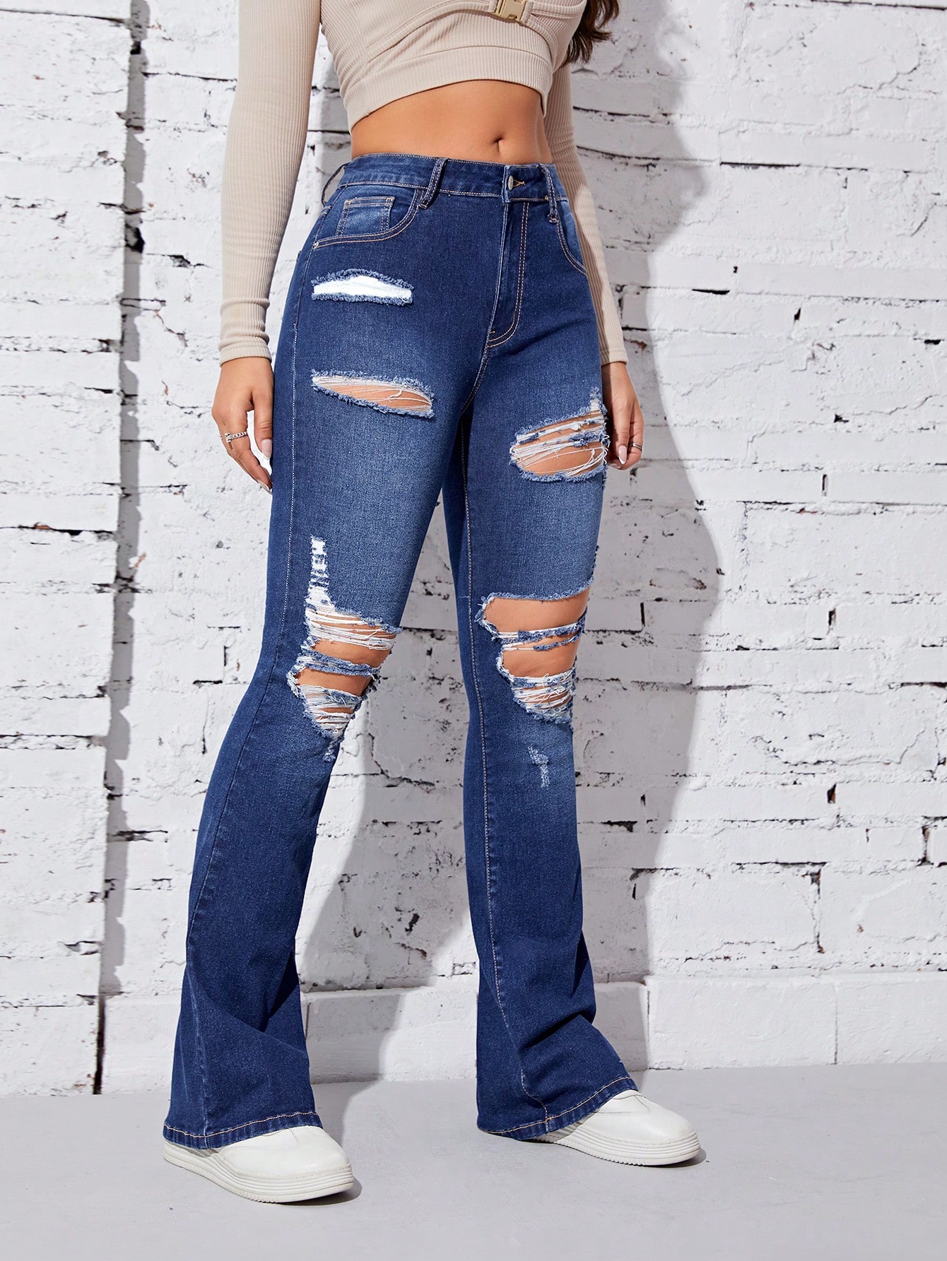 Ripped Cut Out Flare Leg Jeans