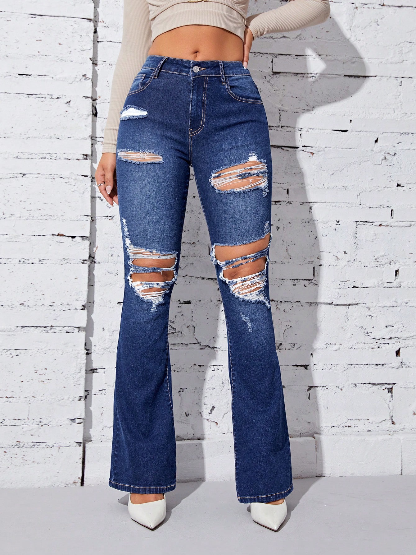 Ripped Cut Out Flare Leg Jeans