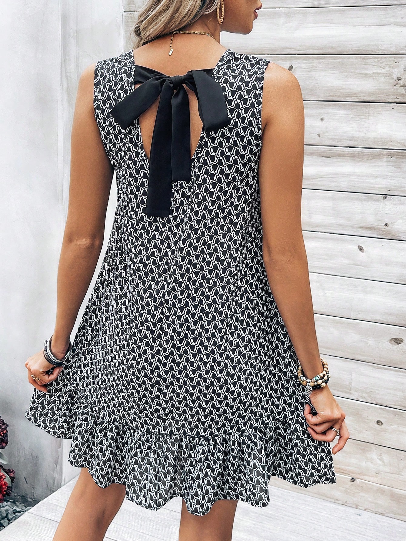 Women's Sleeveless Full Print Dress With Knot Detail On Back